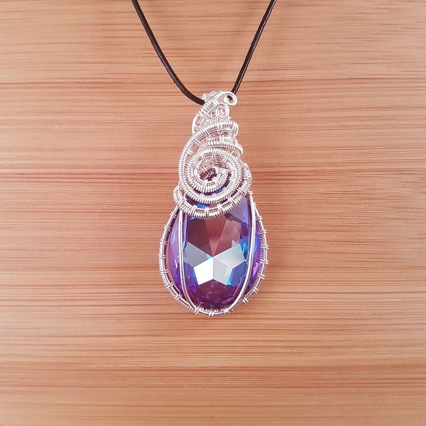 Blue and purple Swarovski pear drop pendant wrapped in silver wire