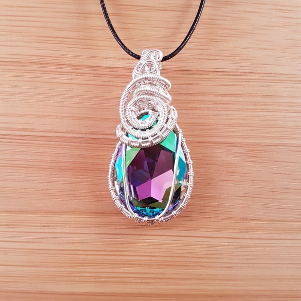 Green and purple Swarovski pear drop pendant wrapped in silver wire